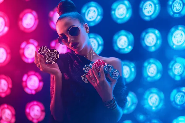 JILI696 Mobile App — Your complete hub for casino and sports A man focused on his laptop with live stats in the background, highlighting the dedicated sports and gaming features of the JILI696 mobile app.